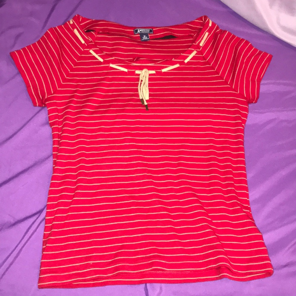 red and brown striped blouse